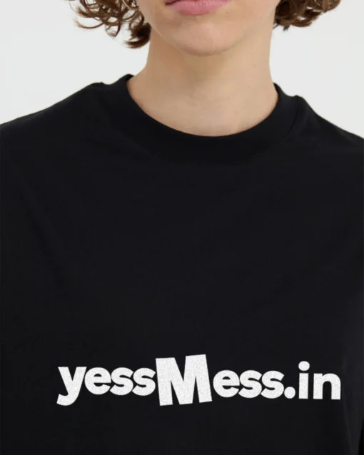 Effortless style with the YessMess Black Basic T-Shirt. Available in sizes Medium and Large—your perfect go-to for a sleek, minimalist look!